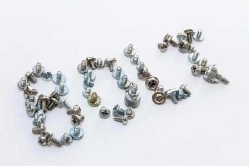 Writing the word bolt from bolts and screws - Free Stock Photo