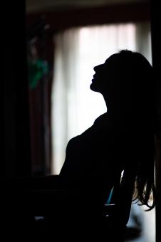 Silhouette of a sexy woman by the window  - Free Stock Photo