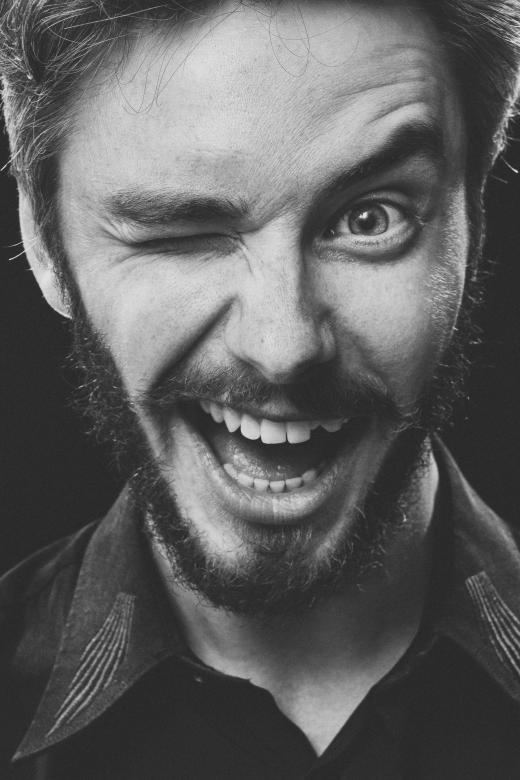 Free stock image of Happy Man Blinking One Eye - Monochrome Portrait created by Alexander Krivitskiy
