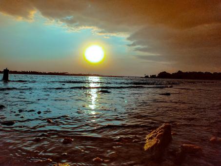 Sunset on Sea - Bright Sun in the Sky - Free Stock Photo
