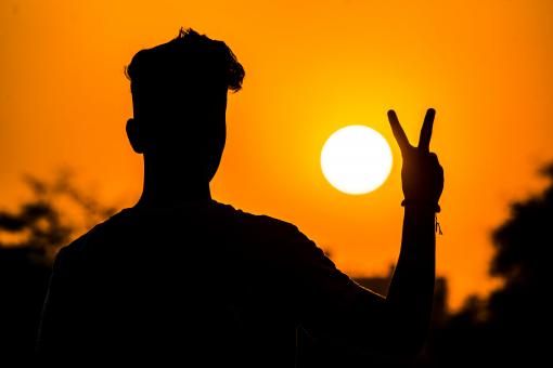 Man Making Peace Sign - Silhouette - Free Stock Photo