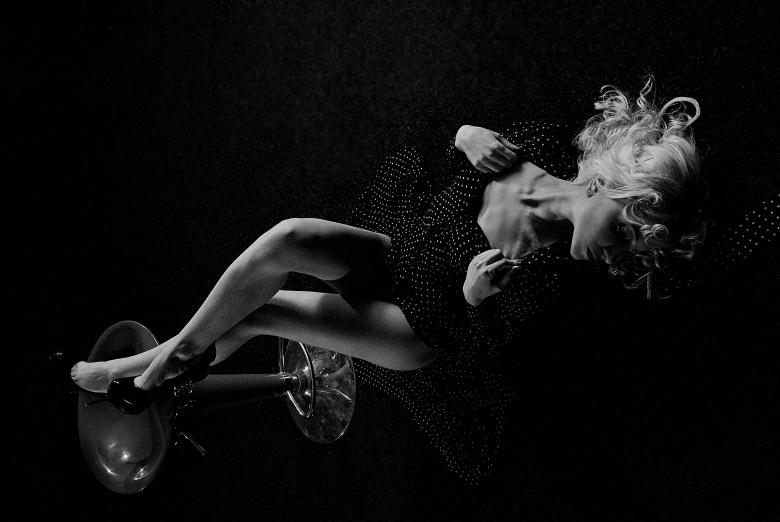 Free stock image of Model Posing with Legs on Chair - Black and White created by Alexander Krivitskiy