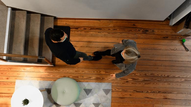 Free stock image of Coworkers Meeting in Hallway created by Maxime