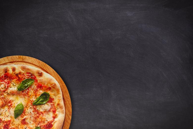 Free stock image of Delicious Pizza on Dark Table Top - With Copyspace created by Jack Moreh