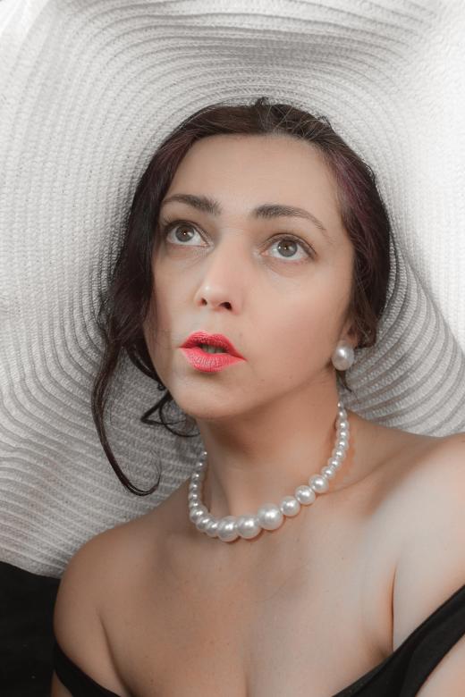 Free stock image of Woman wearing hat created by Alexander Krivitskiy