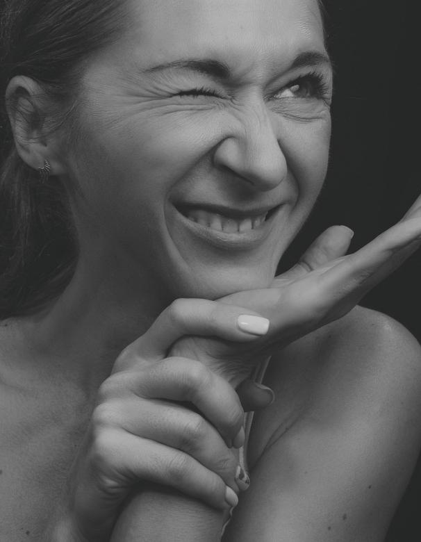 Free stock image of Winking Woman created by Alexander Krivitskiy