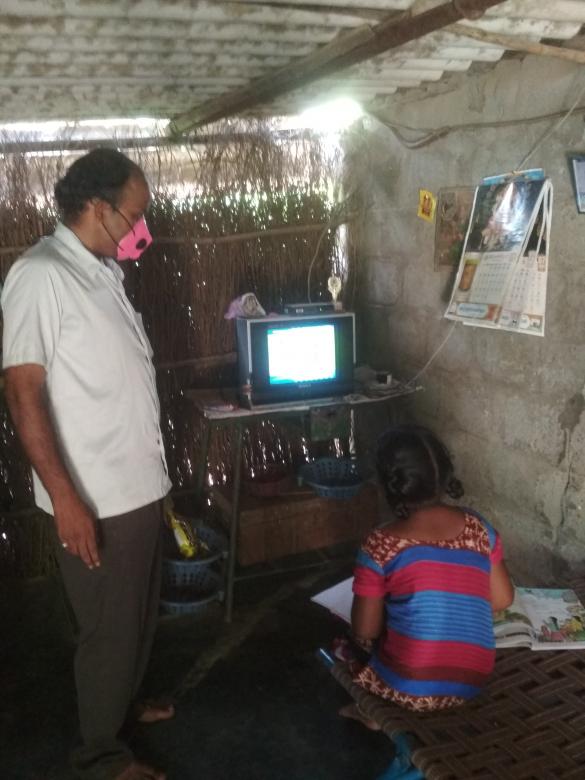 Free stock image of Digital lesson watched by 5th class girl created by Kanduri Narasimha Charyulu