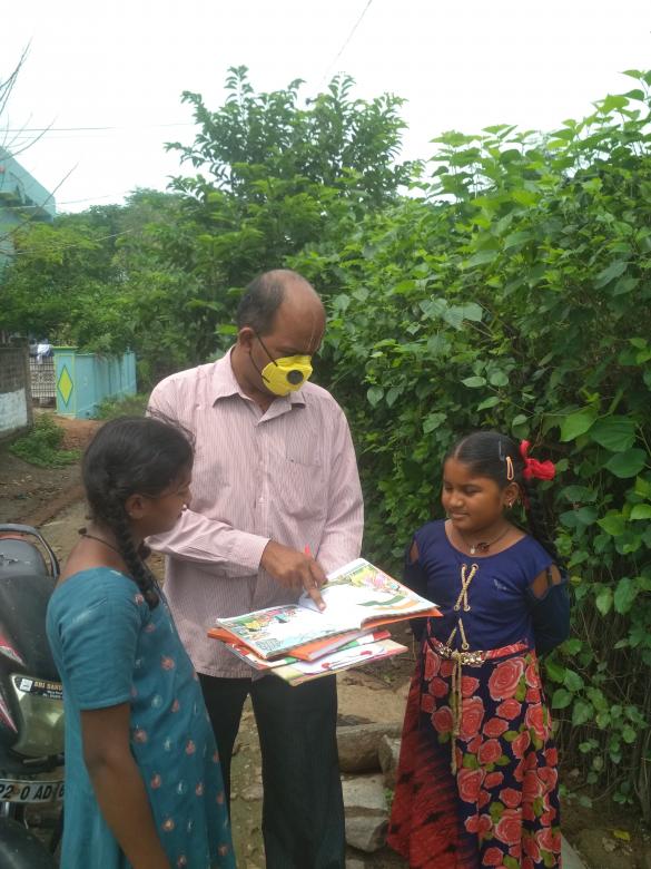 Free stock image of Giving homework and correction notes created by Kanduri Narasimha Charyulu
