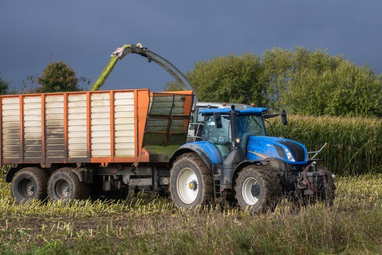 Free stock image of Tractor pulling a trailer created by Mirko Fabian