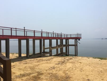 Bridge walkway in front of lake - Free Stock Photo