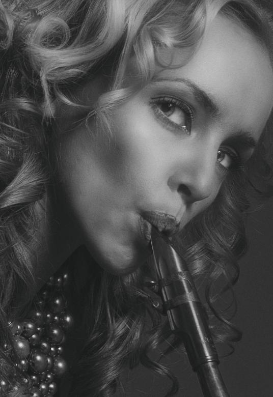 Free stock image of Saxophone player created by Alexander Krivitskiy