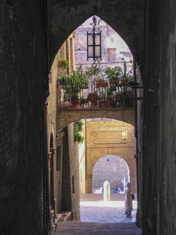 Free stock image of Side street arch SIena created by Julie W