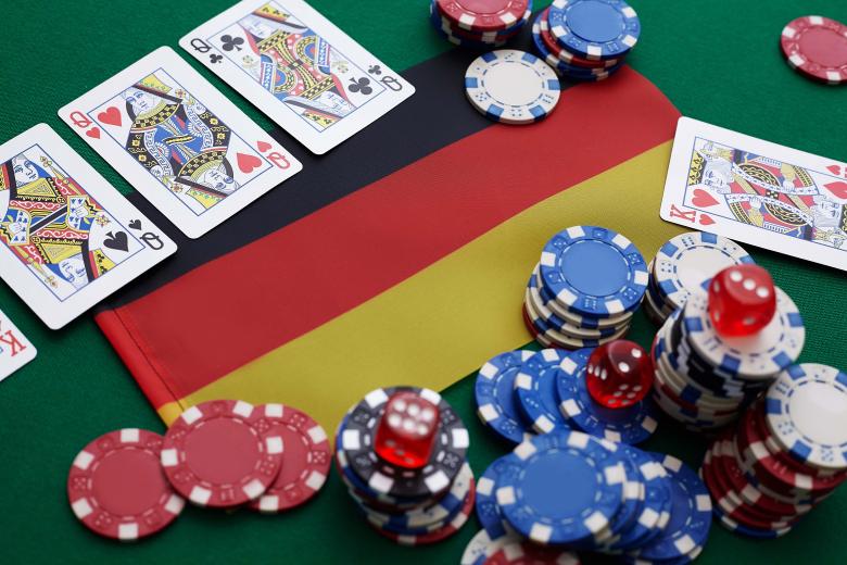 Free stock image of poker chips on green table created by Kristina Becker
