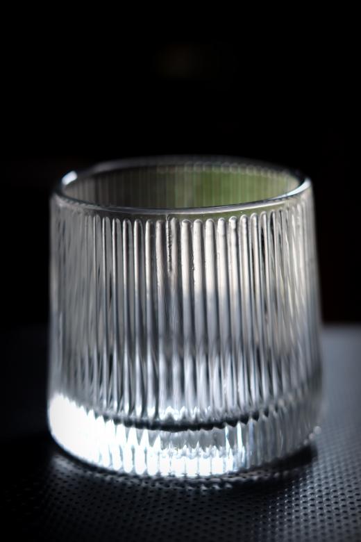 Free stock image of A close-up shot of an empty glass cup with luxury styling created by LUSH.STUDIO