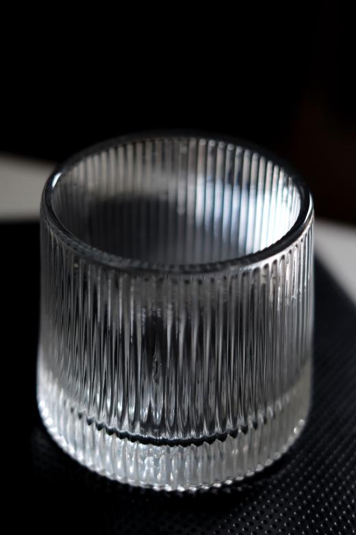 Free stock image of A close-up shot of an empty glass cup with luxury styling for a wine d created by LUSH.STUDIO