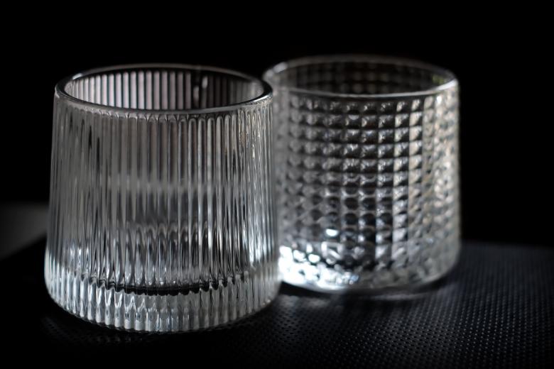 Free stock image of A close-up shot of an empty glass cup with luxury styling for a wine d created by LUSH.STUDIO