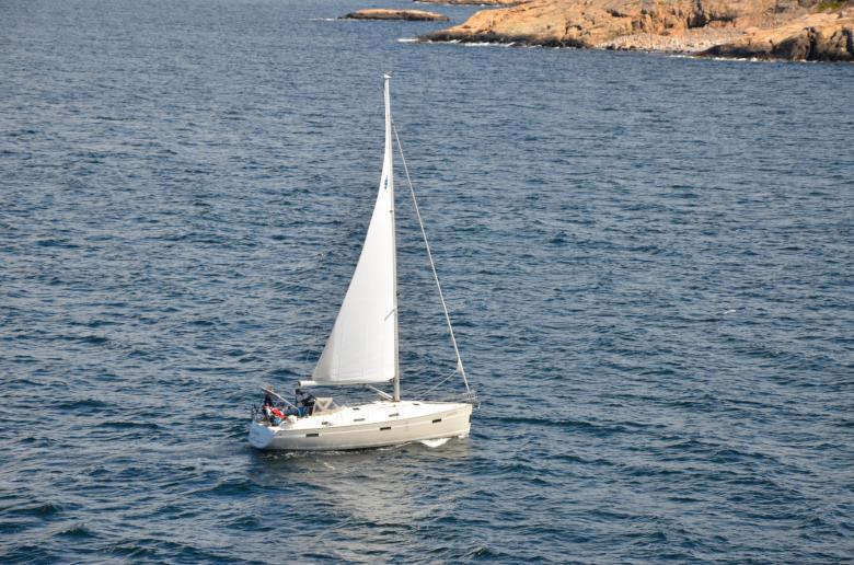 Free stock image of A sailing ship is sailing not far from the coast created by Erik Schellingerhout