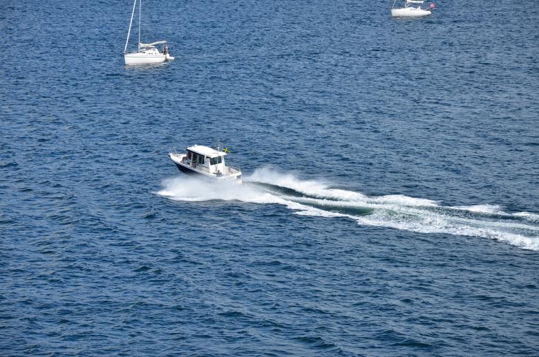 Free stock image of A speedboat is moving around created by Erik Schellingerhout