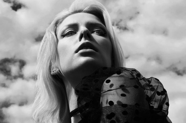Free stock image of Dramatic Portrait of a Woman Gazing Outdoors created by Alexander Krivitskiy