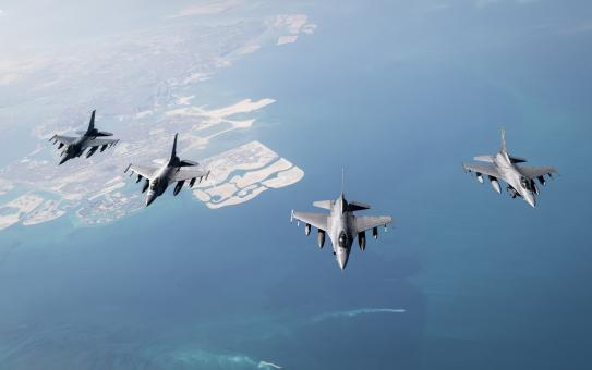 U.S. Air Force F-16 Fighting Falcons fly over