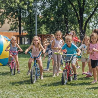 Children having fun riding bikes