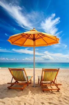 View of summer beach chairs with umbrella